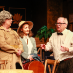 Three characters aboard the Nile steamer in a scene from Highbury Players' Agatha Christie mystery.