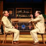 Canon Pennefather and Simon Mostyn in conversation aboard the Nile steamer in Highbury Players' Murder on the Nile.